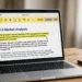 A laptop on a desk showing a PDF document open with a highlighter annotation toolbar, a pen beside it