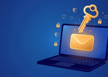Illustration of a golden master key hovering over a glowing inbox icon on a laptop screen, surrounded by shields and padlocks