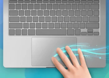 Top-down illustration of a laptop with a hand swiping three fingers across the trackpad, with glowing motion trails showing the gesture