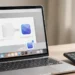 A laptop and smartphone on a desk showing a website being turned into a standalone app icon